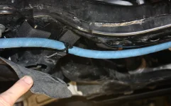 oil pan rerouted hose.webp