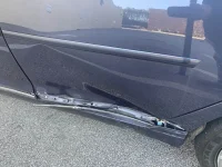 DAAMGE TO LEFT REAR DOOR.webp