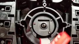 12-Removed 3 teensy nuts + lock washers to remove plate & find spring + ball bearing.webp